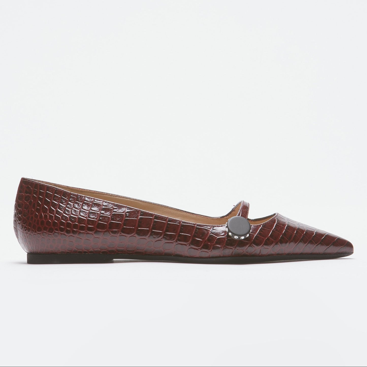 Women's brown pointed-toe flats with bow detail