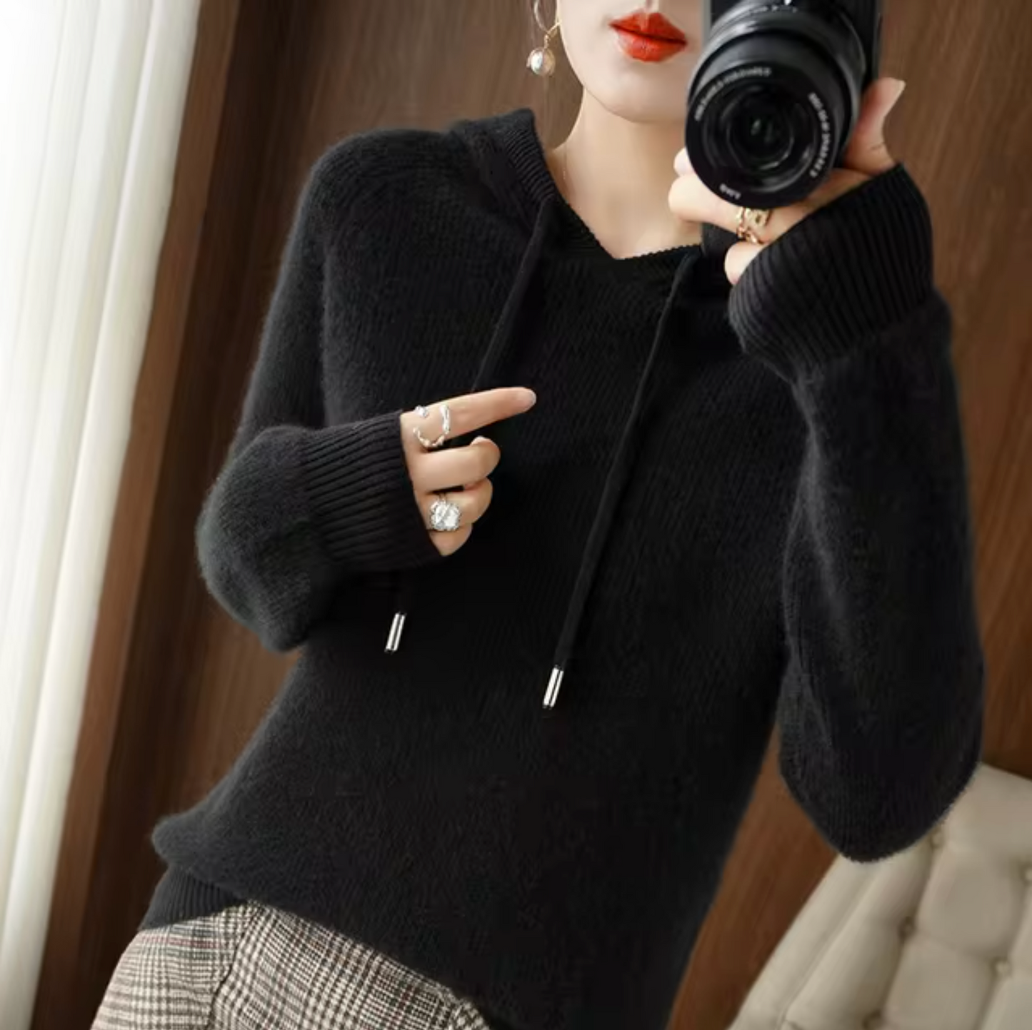 Women's hooded knitted sweater with drawstring