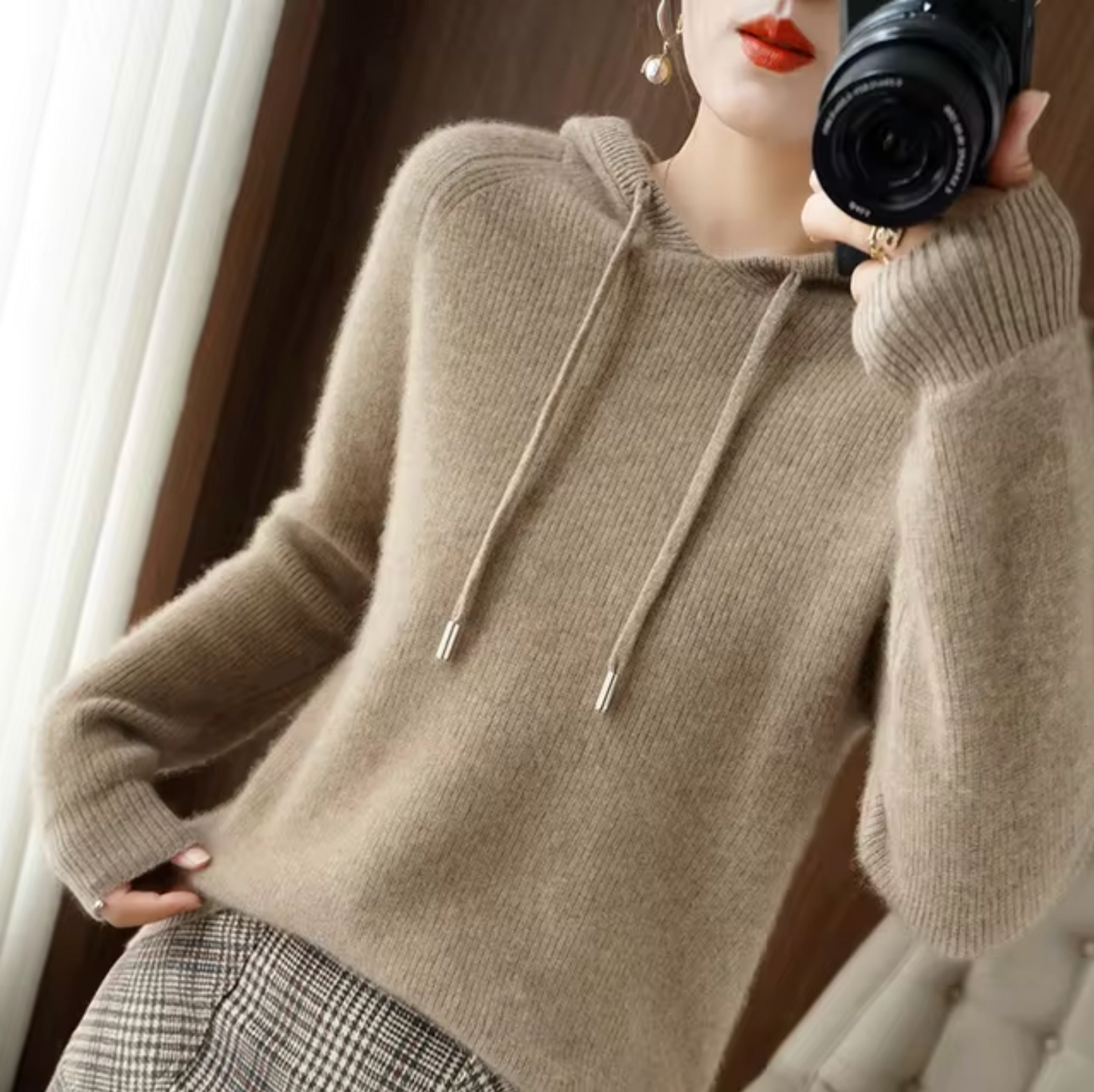 Women's hooded knitted sweater with drawstring
