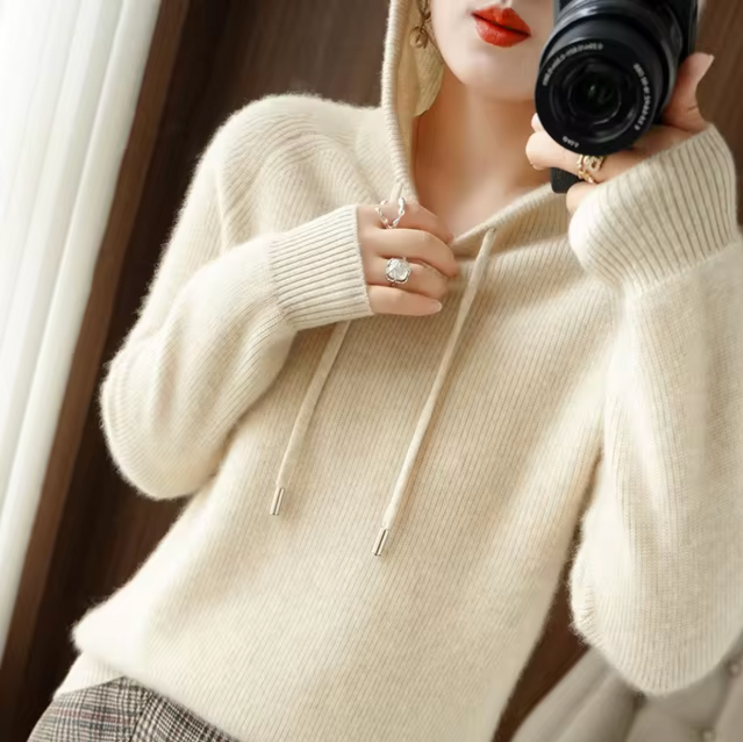 Women's hooded knitted sweater with drawstring