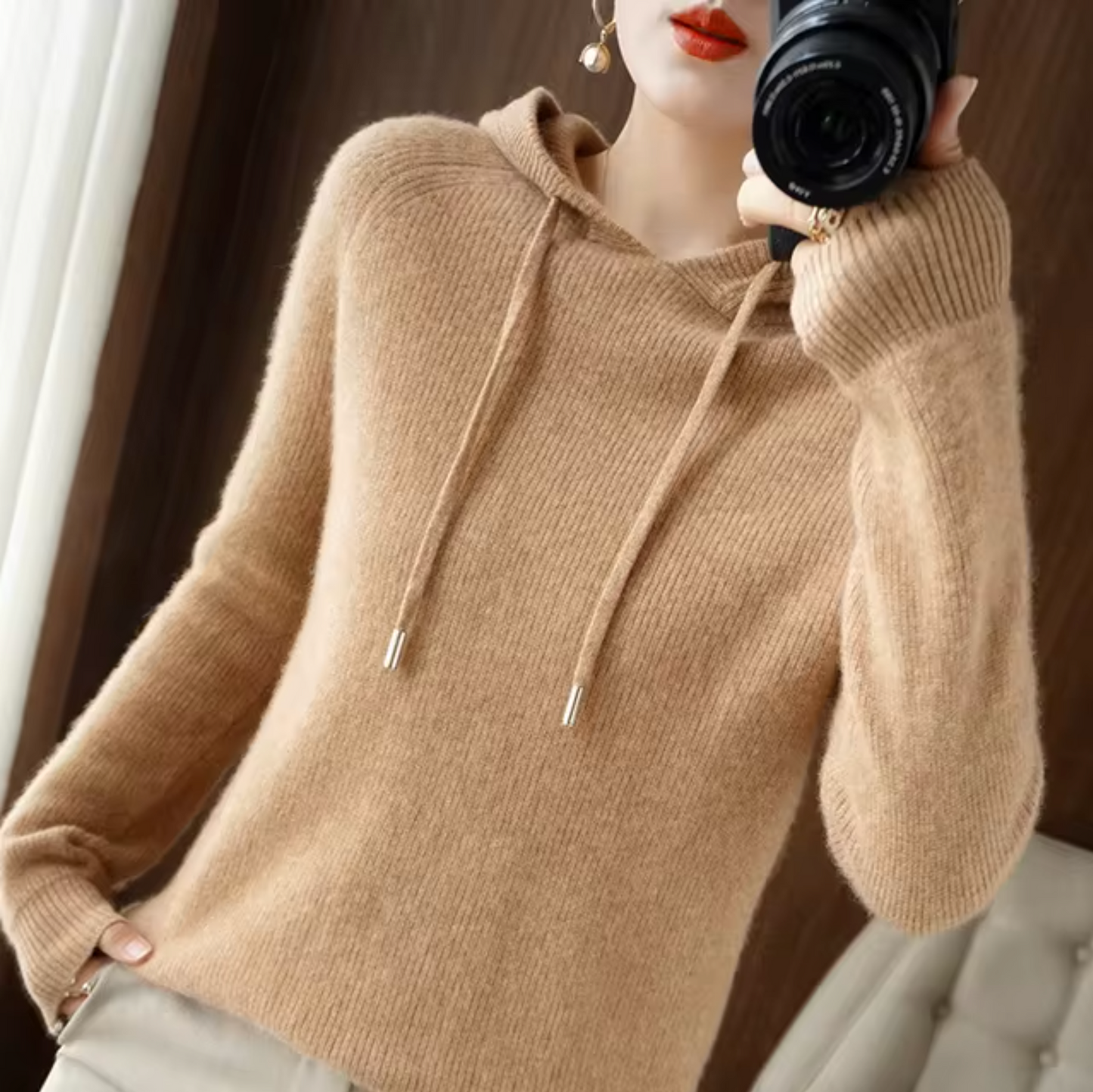 Women's hooded knitted sweater with drawstring