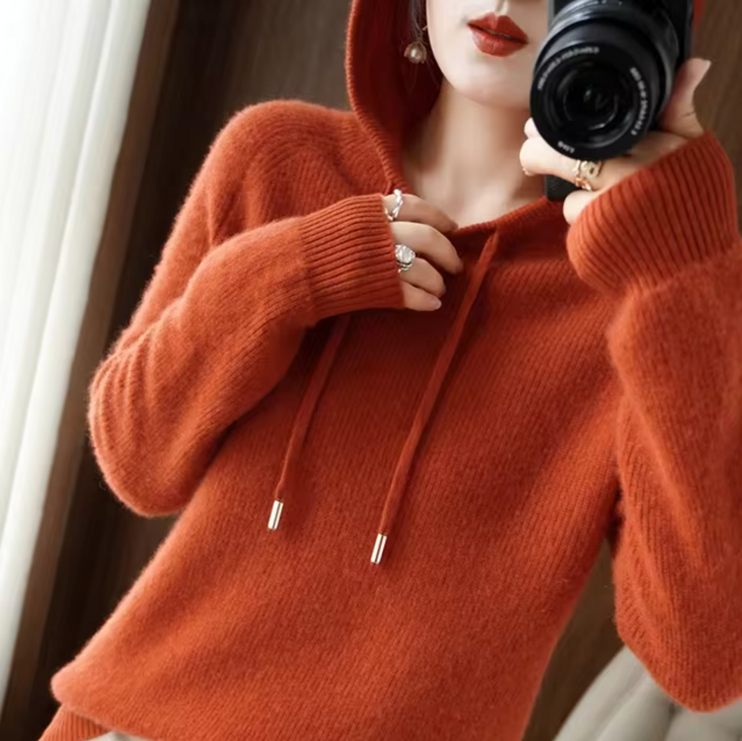 Women's hooded knitted sweater with drawstring