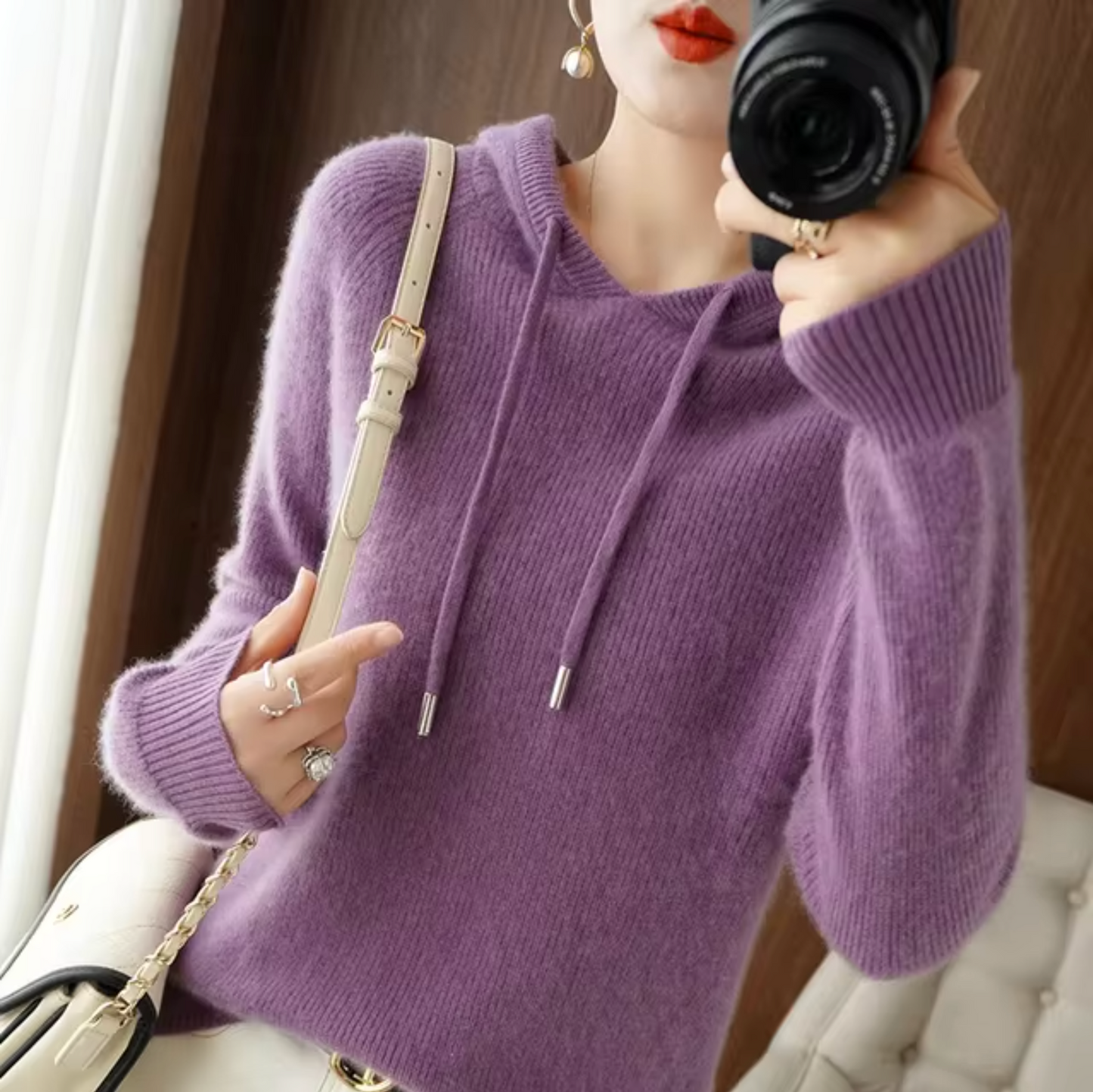 Women's hooded knitted sweater with drawstring